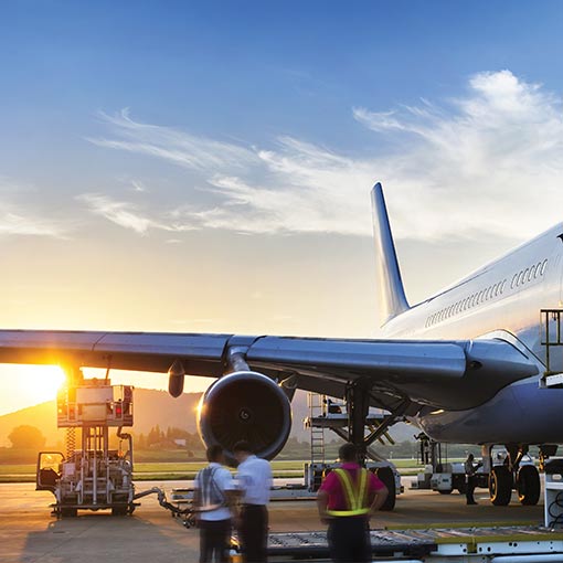 photo of loading cargo onto airplane