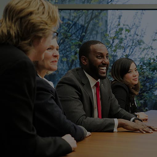 photo of employees in meeting