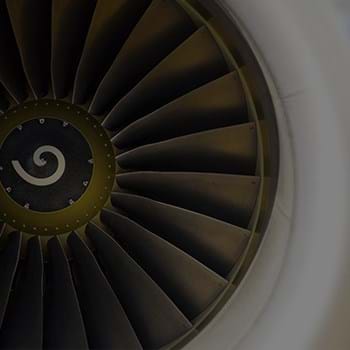 close of photo of jet engine