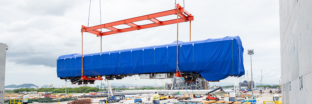oversized load being moved by a crane